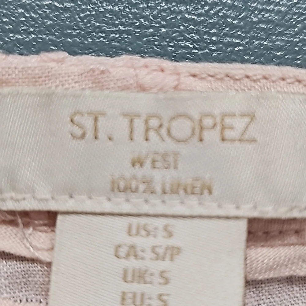 St. Tropez women's light pink top. Embrodery.V neck with three buttons.‎